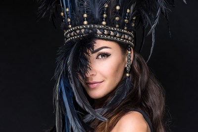 Woman in elaborate feather headdress