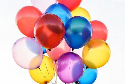 Colorful Balloons Cluster on White Background