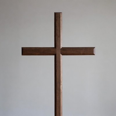 Wooden cross on white background