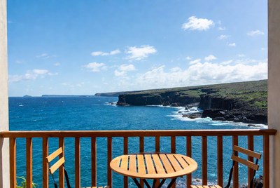 Ocean View Balcony with Table and Chairs