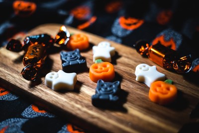 Halloween Candy on Wooden Board