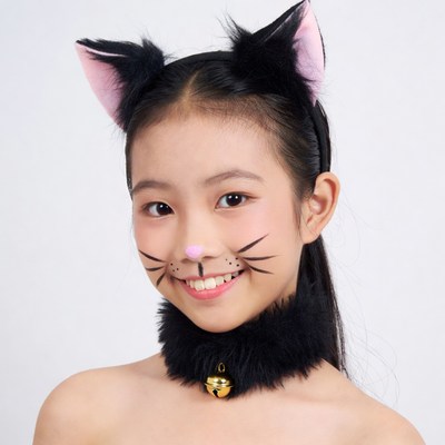 Asian girl in cat ears costume