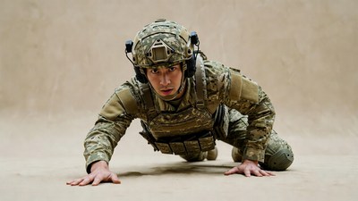 Asian soldier in camouflage pushup pose
