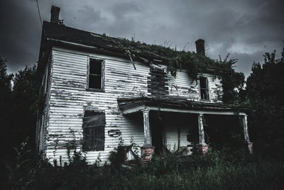 Abandoned haunted house in woods