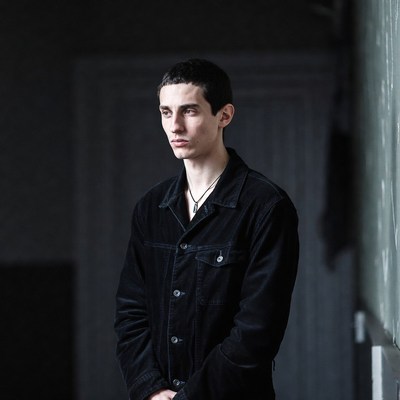 Young man in black jacket