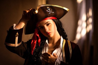 Woman in pirate costume with hat