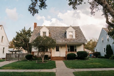 White Colonial House with Landscaping