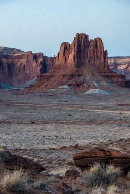 Towering Red Rock Formation in Desert