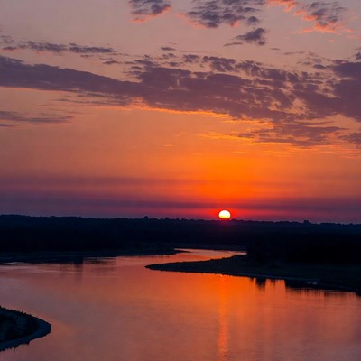 Sunset over winding river