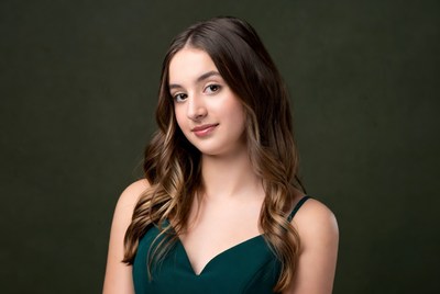 Teen girl in green dress