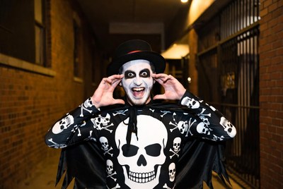 Man in skull face paint costume