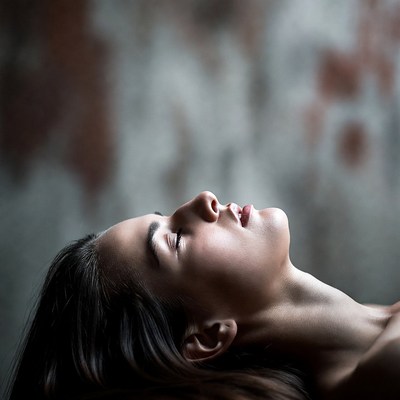 Woman with eyes closed profile