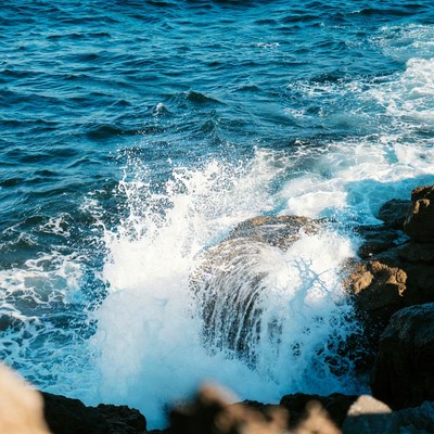Ocean Waves Crashing on Rocks