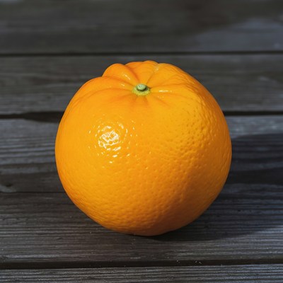 Fresh orange on wooden surface