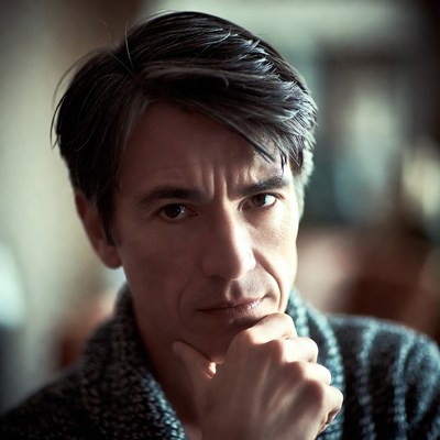 Man with hand on chin