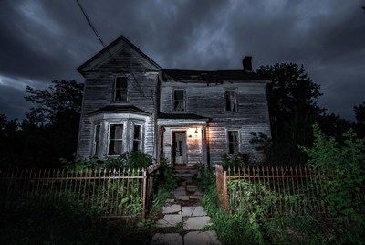 Abandoned haunted house at night