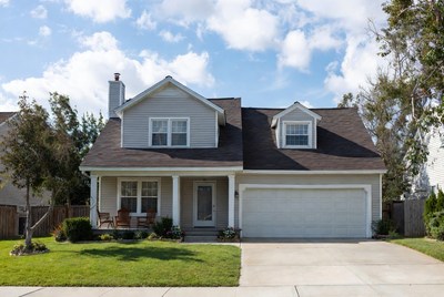 Gray Suburban House with Garage