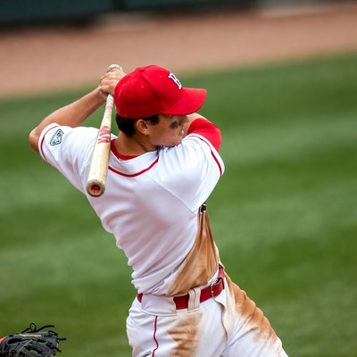 Boy swinging baseball bat