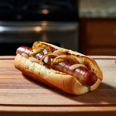 Grilled Sausage Hot Dog with Mustard and Onions