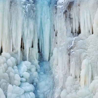 Massive Icicles on Frozen Waterfall