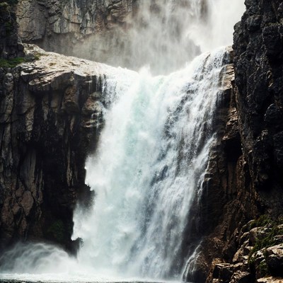Majestic waterfall cascading over rocky cliffs