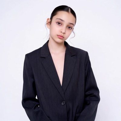 Asian girl in black pinstripe blazer