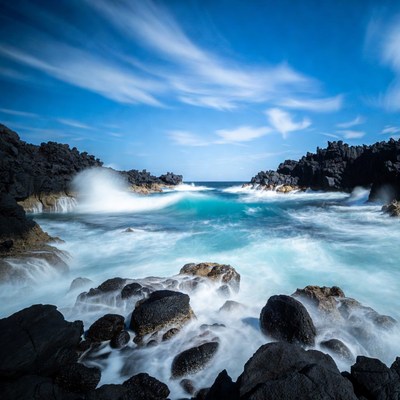 Ocean Waves Crashing Volcanic Rocks