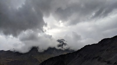 Cloudy Mountains with Peaks