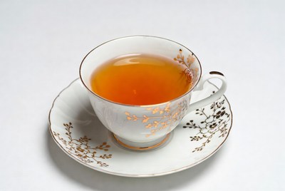 White porcelain teacup with saucer