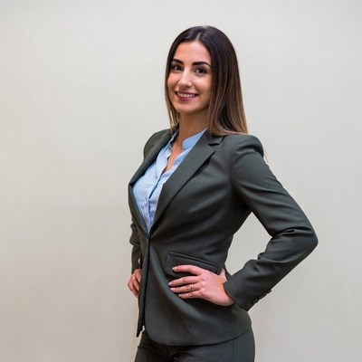 Smiling woman in gray suit