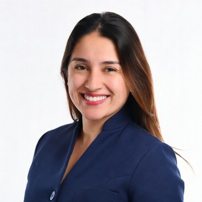 Smiling Latina woman in navy blazer