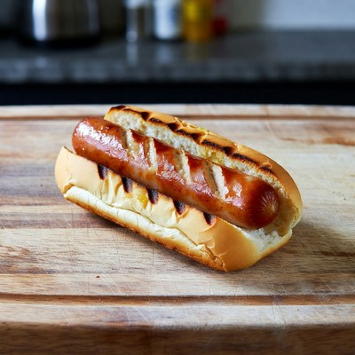 Grilled Hot Dog on Wooden Board