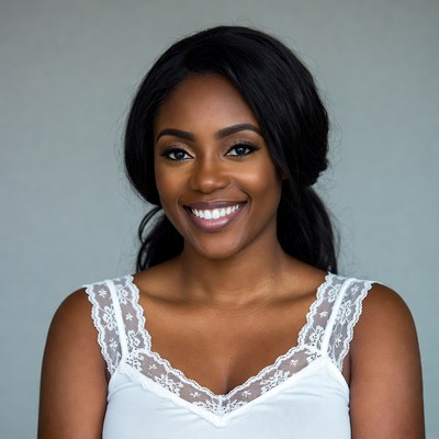 Smiling African-American woman in lace top