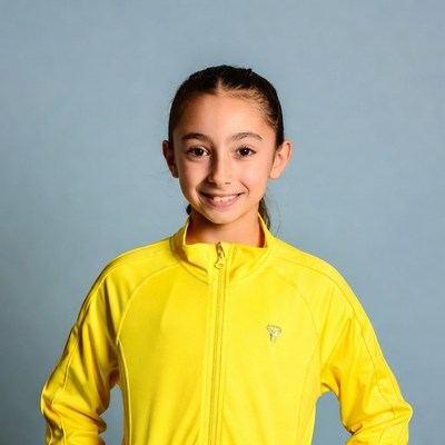 Smiling girl in yellow jacket