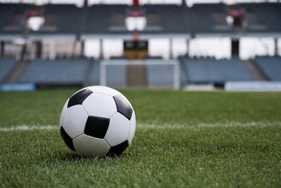 Soccer Ball on Grass Field