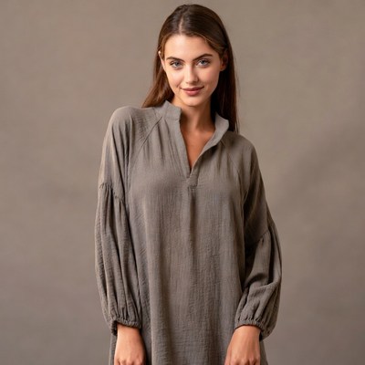 Woman in gray linen dress
