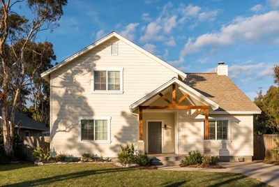 Modern beige house with wooden porch