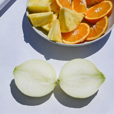 Sliced Pineapple, Oranges, and Onions