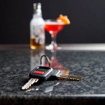 Car Keys with Cocktail and Beer