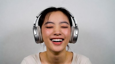 Asian girl smiling with headphones
