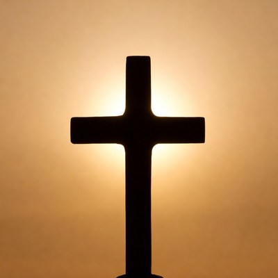 Silhouette Cross with Sunlight Glow