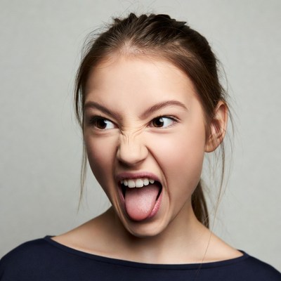 Girl sticking out tongue
