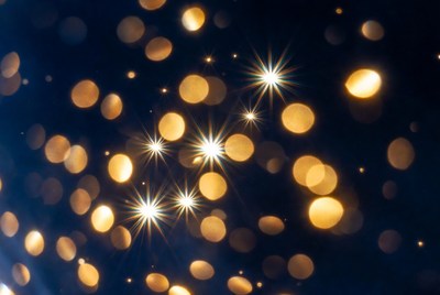 Golden Bokeh Lights on Black Background