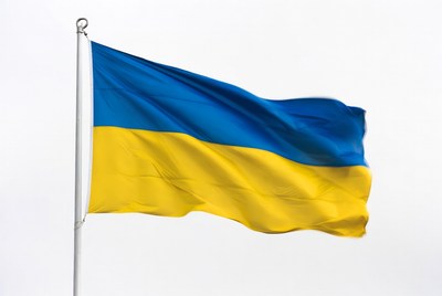 Ukrainian flag waving on pole