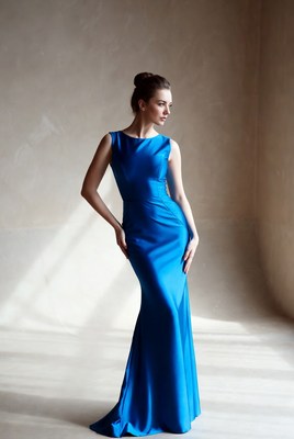 Woman in blue satin gown