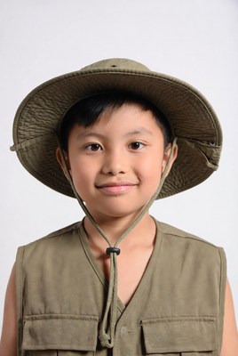 Asian boy in explorer hat and vest