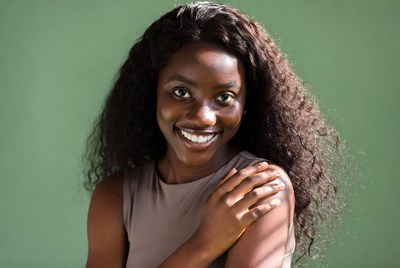 Smiling African-American woman with curly hair