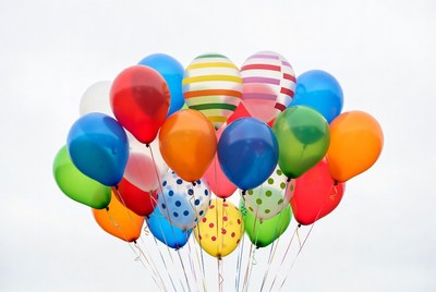Colorful Balloons Cluster on White Background