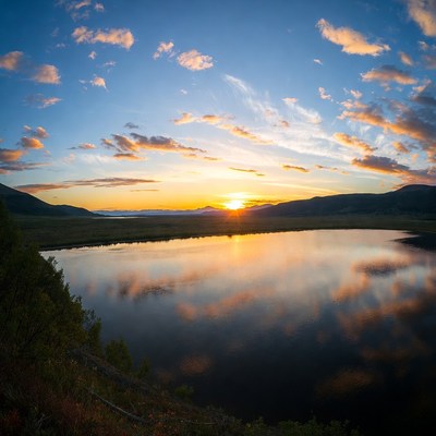 Sunset over mountain lake