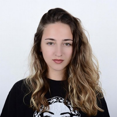 Young woman in black skull t-shirt